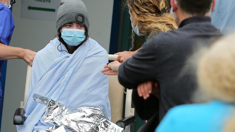 Sara Feeney joining  her parents at the Galway Hospital after the rescue operation. Photograph: Hany Marzouk