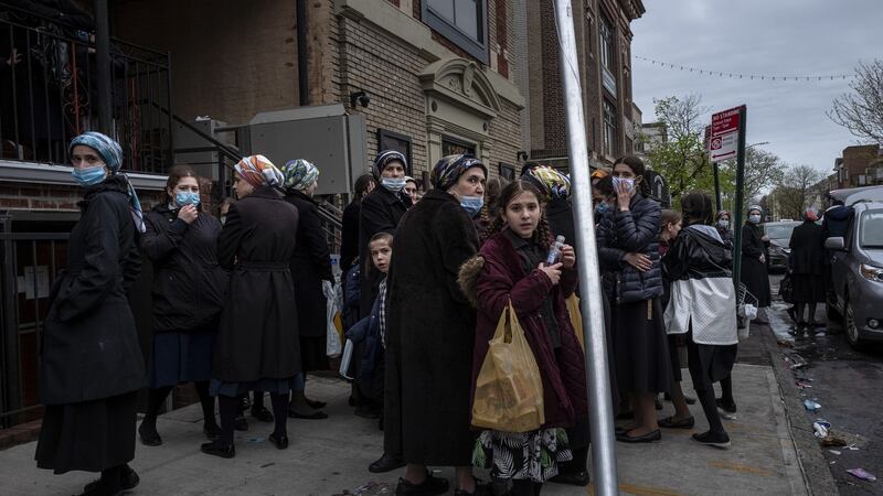 A funeral in the Borough Park neighbourhood of Brooklyn. The New York suburb was hit hard by coronavirus, reaching thousands of cases and hundreds of deaths by April. Photograph: Jonah Markowitz/The New York Times