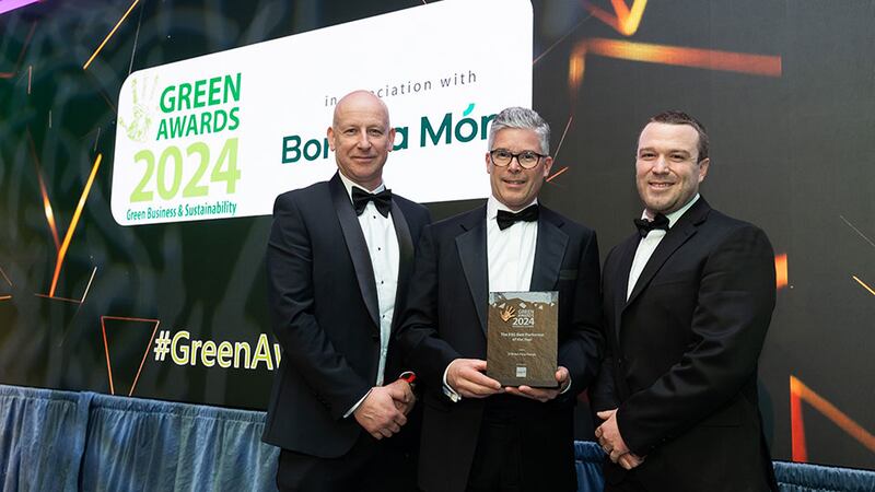 Jonathan McKeown, associate director at Davy Horizons, Davy Group, presents the ESG best performer of the year award to Nicholas Reynolds and Chris Caulfield, O'Brien Fine Foods