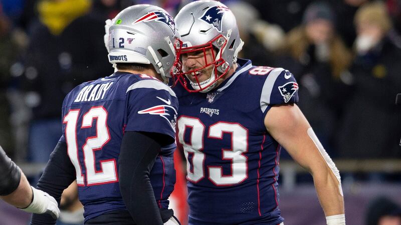 New England Patriots quarterback Tom Brady  celebrates with tight end Matt LaCosse after LaCosse caught a touchdown pass against the Buffalo Bills during the first half at Gillette Stadium in Foxborough, Massachusetts, Photograph: CJ Gunther/EPA