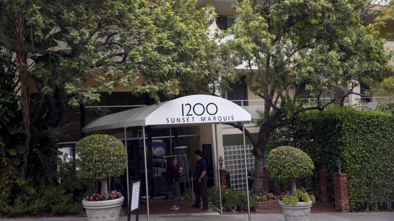 Media gather outside the Sunset Marquis hotel where U2 tour manager Dennis Sheehan was pronounced dead in his hotel room,  in West Hollywood, California. Photograph: Reuters