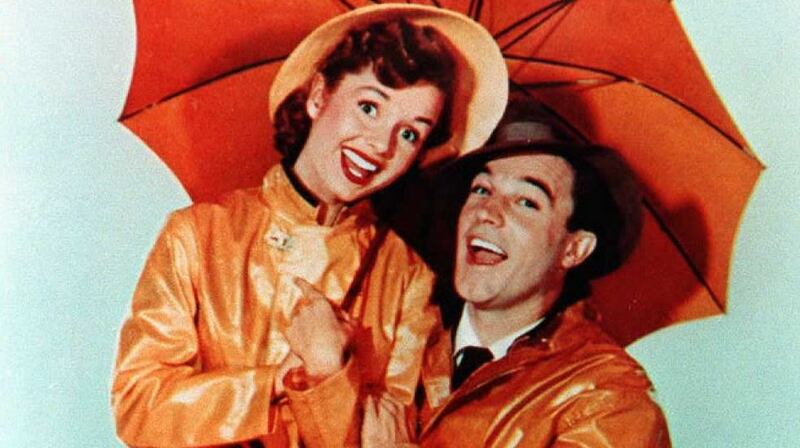 Gene Kelly with  Debbie Reynolds, from the movie Singin’ in the Rain. Photograph: AFP/Getty Images
