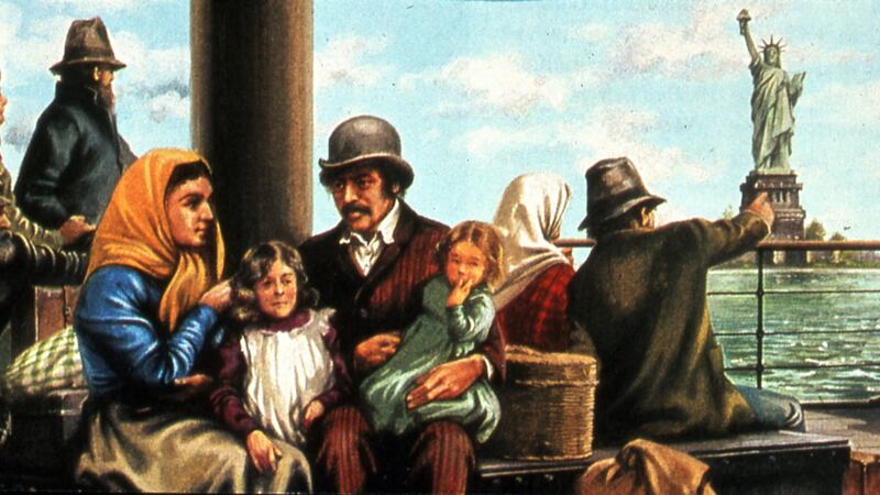 Irish (in tall hats) and European immigrant families arriving in New York harbour and approaching Ellis Island where they would be processed c1900. Photograph: Universal History Archive/Getty Images