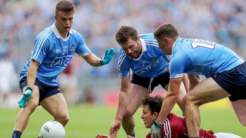 Dublin’s Eoin Murchan, Jack McCaffrey and Brian Howard put the pressure  on Galway’s Seán Armstrong during the  All-Ireland SFC semi-final at Croke Park. Photograph: Tommy Dickson/Inpho
