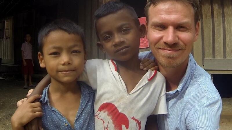 Henk van der Klok teaching English to Burmese orphans in Mae Sot, Thailand