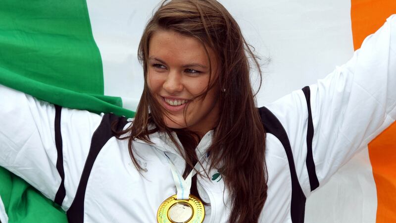 Grainne Murphy shows off her silver medal in 2010. Photograph: Cathal Noonan/Inpho