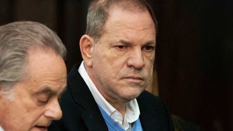 Harvey Weinstein (right), stands with his attorney Benjamin Brafman during a court proceeding in New York on Friday. Weinstein was arraigned  on rape and other charges in the first criminal prosecution to result from the wave of allegations against him that sparked a national reckoning over sexual misconduct. Photograph: Steven Hirsch/New York Post via AP