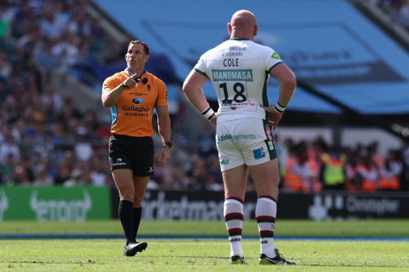 Referee Karl Dickson points towards Dan Cole of Leicester Tigers before issuing a yellow card during the Premiership final. Photograph: Michael Steele/Getty Images