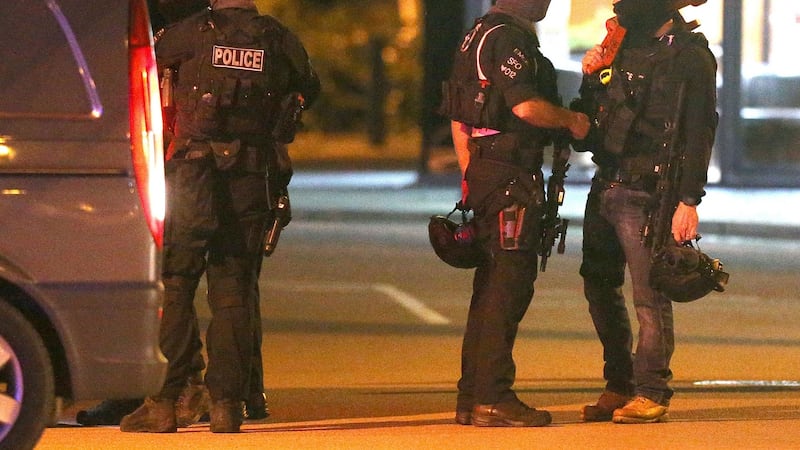 Police at the scene  where a gunman was holding two bowling alley members of staff hostage and has now been arrested. Photograph:  Aaron Chown/PA Wire