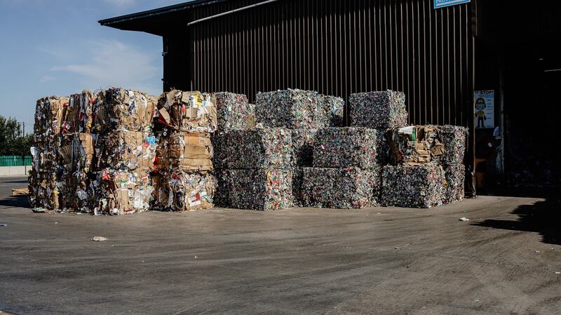 Baled paper, plastic and metals waiting the next stage on their journey.