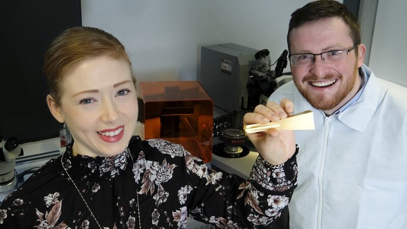 Marie Bourke, space program manager, and Liam Kenny of additive manufacturing at Arralis, with a 3D-printed 94GHz antenna. Photograph: Don Moloney