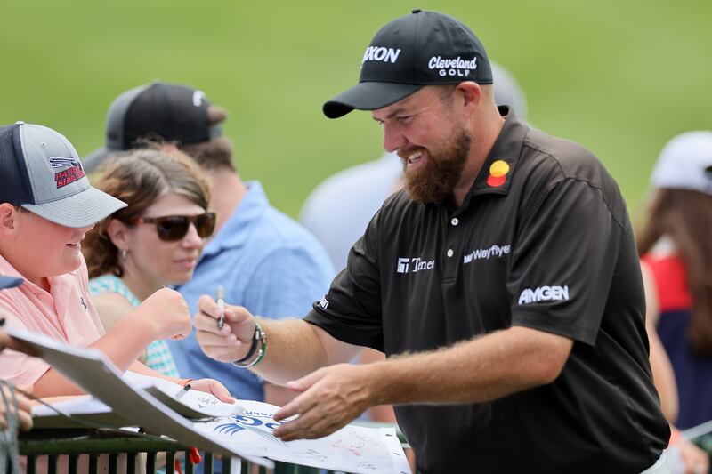 Shane Lowry of Ireland signs autographs during a practice round prior to the 2024 PGA Championship at Valhalla. Photograph: Andy Lyons/Getty