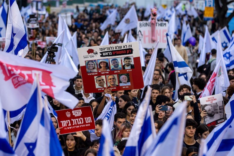 Israeli youth, led by Israeli Scouts from Kibbutz Kfar Aza, protest for the release of hostages held in Gaza. Photograph: Maja Hitij/Getty Images News