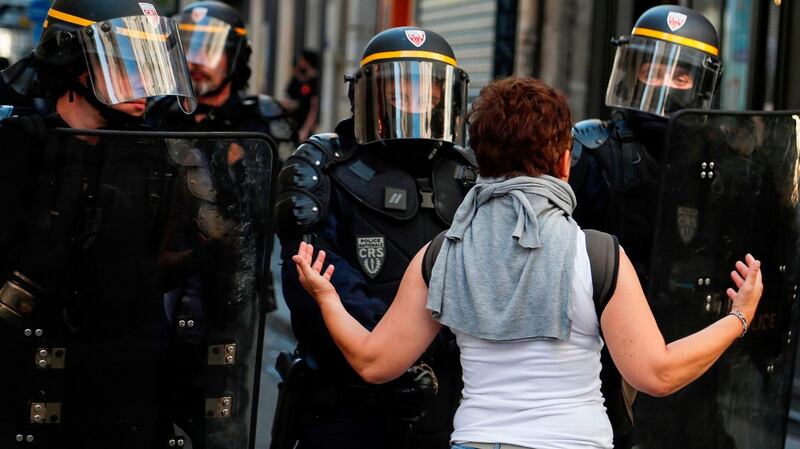 A woman remonstrates with riot police during an anti-government yellow-vest demonstration  on Saturday  in Paris.  The yellow-vest (gilets jaunes) protests first erupted last November. Photograph: Zakaria Abdelkafi/AFP/Getty