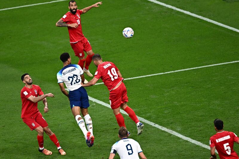 England's midfielder Jude Bellingham scores the opening goal against Iran at the Khalifa International Stadium in Doha. Photograph: Anne-Christine Poujoulat/AFP via Getty