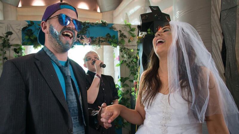 Electric Picnic 2018: Trevor Luby and Shannon Murphy, who got “married” in the festival’s inflatable church. Photograph: Dave Meehan