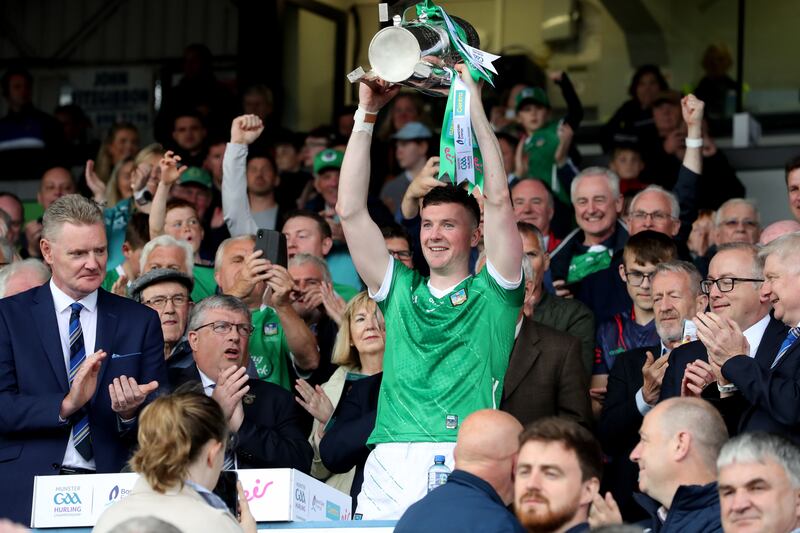 Limerick's Declan Hannon lifts the Mick Mackey Cup after the victory over Clare in Thurles. Photograph: Bryan Keane/Inpho