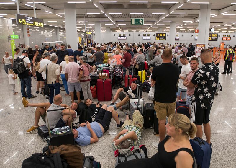 Thomas Cook customers wait to fly home from Majorca after the company’s collapse. Photograph: Jaime Reina/AFP/Getty