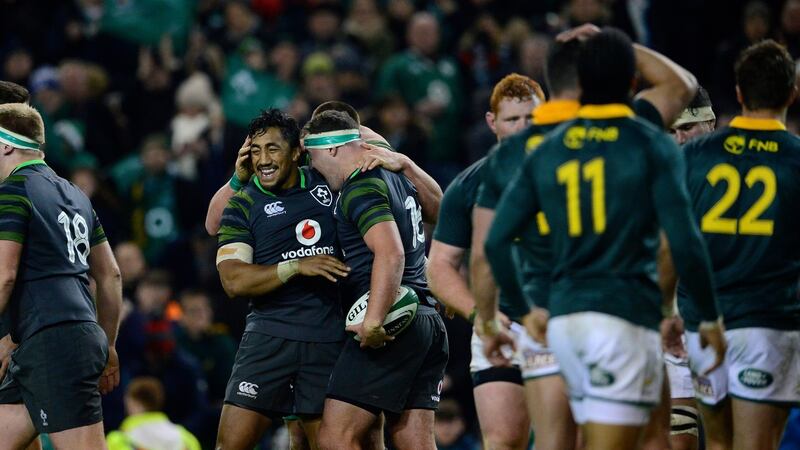 Bundee Aki celebrates with Rob Herring after the latter’s try. Photograph: Cyril Byrne/The Irish Times