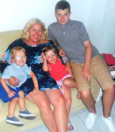 Yvonne, Finn, and the twins on holiday in 2017