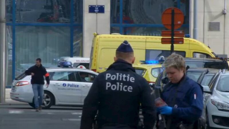 Emergency personnel are seen at the scene of a blast outside a metro station in Brussels. Photograph: Reuters TV