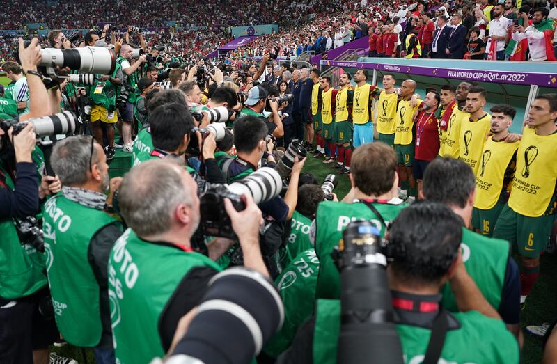 Photographers take pictures of Portugal's Cristiano Ronaldo on the subs bench during the Portugal v Switzerland match at the Lusail Stadium in Qatar on Tuesday. Photograph: Mike Egerton/PA Wire