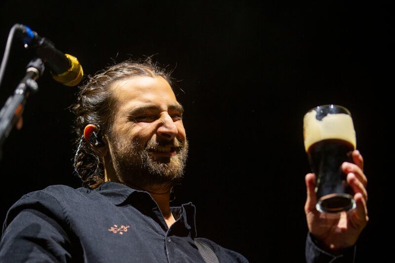 Noah Kahan trying to split the G on a pint of Guinness. Photograph: Tom Honan