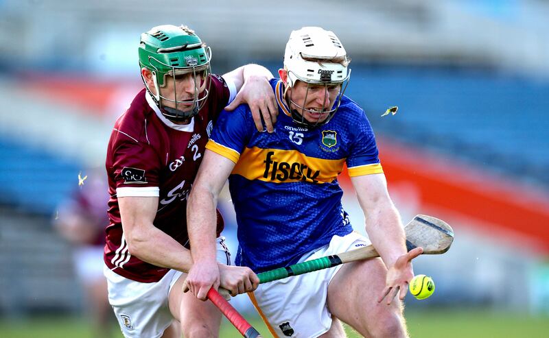 Tipperary’s Sean Ryan and Jack Grealish of Galway in action. Photograph: Ryan Byrne/Inpho
