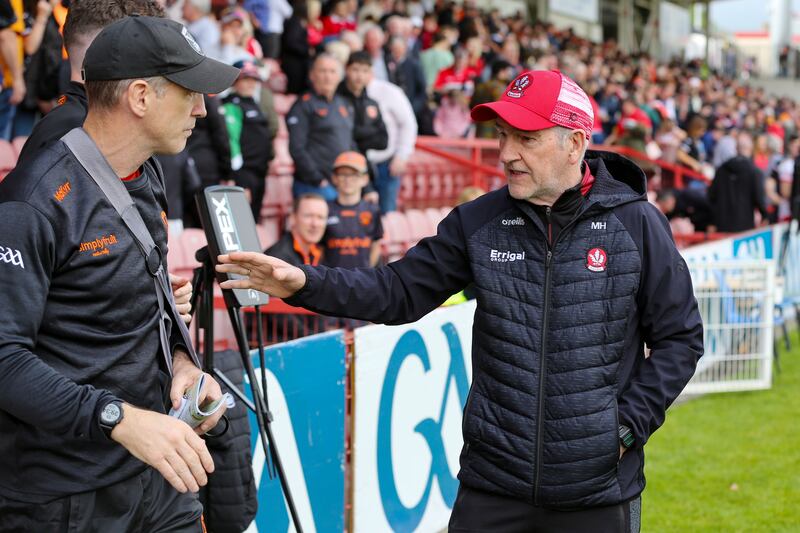 Armagh manager Kieran McGeeney is congratulated by Derry manager Mickey Harte after the game in Celtic Park. Derry have arrived at the most important part of the year in tatters. They look mentally wrecked. Photograph: Lorcan Doherty/Inpho