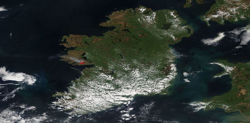 Satellite imagery of the gorse fires. The images are from May 9th. The red marks are called "thermal anomalies" or, as most people would say, fires. Image courtesy of NASA