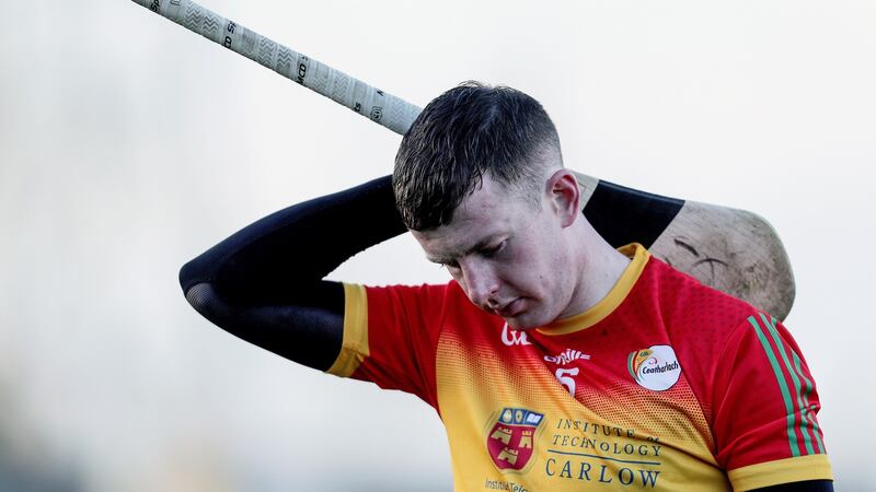 Carlow’s Kevin McDonald looks dejected  after his side’s defeat to Clare. Photograph: Laszlo Geczo/Inpho