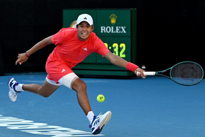 Learner Tien hits a return against France's Corentin Moutet. Photograph: Paul Crock/Getty