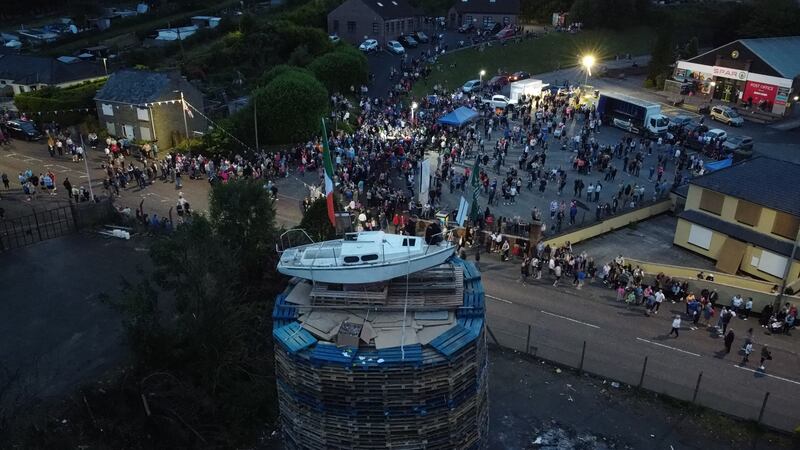 Crowds gathered around the pyre in Moygashel to mark the Twelfth. Photograph: Niall Carson/PA Wire
