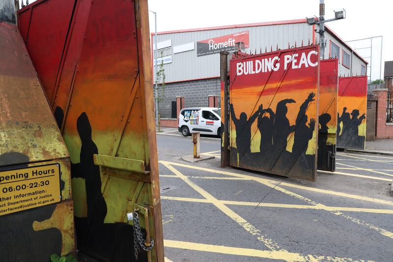 The peace gates at Lanark Way between the Shankill and Falls roads close every evening at 10.30pm and reopen at 6am. Photograph: Bryan O’Brien 

