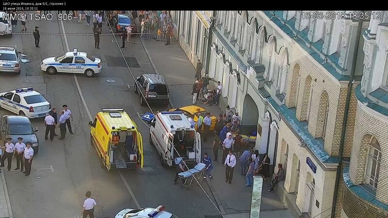 Ambulances attend scene after a taxi hit pedestrians including Mexico World Cup supporters in the center of Moscow, Russia on Saturday. Photograph:  Moscow Government’s Center of Traffic Control / EPA