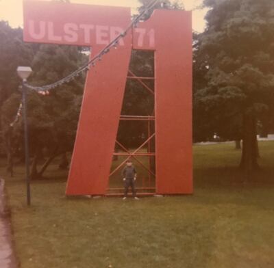 A young Donald Clarke before  the giant 71 outside Belfast’s  Botanic Gardens, erected to mark the 50th anniversary of Northern Ireland