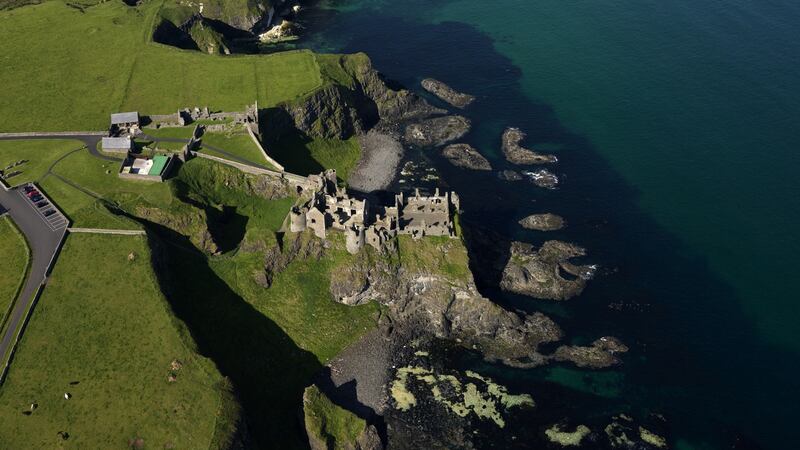 A loop of the Causeway Coastal Route, from Belfast to the north Antrim coast, is also listed in the book. Photograph: Tourism Ireland