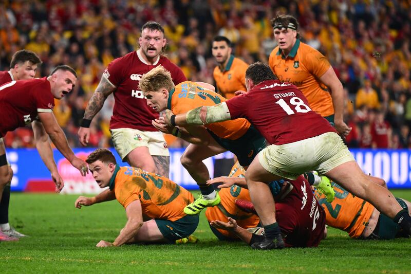 Tate McDermott scores a try for the Wallabies. Photograph: Matt Roberts/Getty Images
