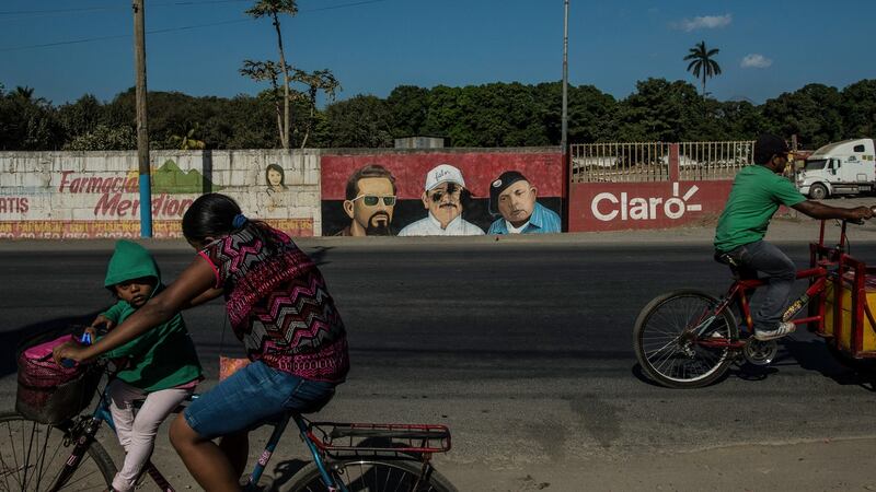 Black paint splattered over an image of Nicaragua’s president Daniel Ortega in Rivas, Nicaragua. In parts of the country, public images of Ortega have been hit with paint over his support for a canal project. Photograph: Meridith Kohut/New York Times