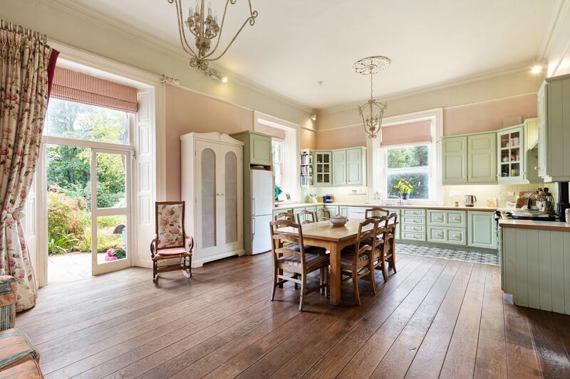 The kitchen/dining area has an air of spacious elegance