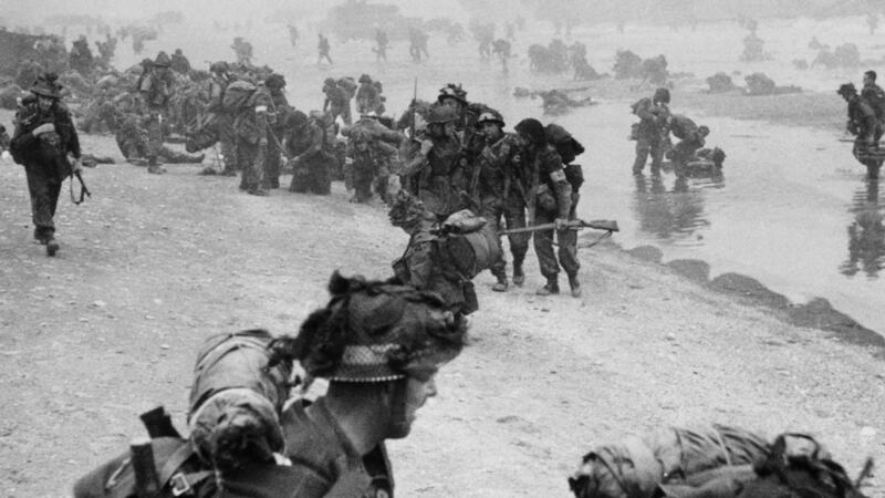 Alied soldiers, including wounded, on the one of the beaches at Normandy on June 6th, 1944. Photograph: Popperfoto/Getty Images