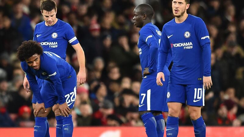 Chelsea’s Willian went off injured during the first half of their defeat to Arsenal. Photograph: Glyn Kirk/AFP