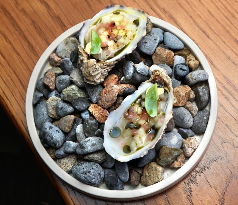 Dooncastle oyster, fermented cucumber, dill oil, creme fraiche in Daróg Wine bar. Photograph: Joe O'Shaughnessy