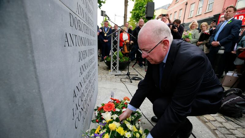 Minister for Foreign Affairs Charlie Flanagan lays a wreath at a commemorative event to mark the 43rd anniversary of the Dublin and Monaghan bombings. Photograph: Nick Bradshaw