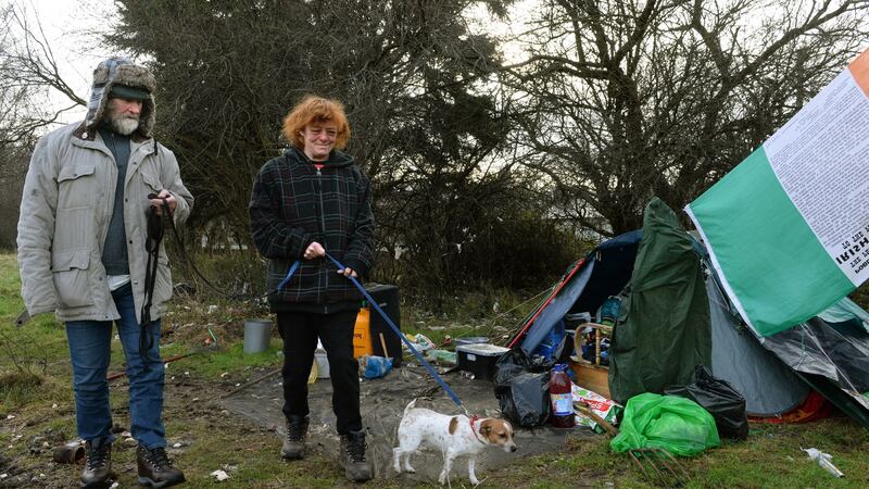 Sabrina and Joe with their dog Cindy. Photograph: Dara Mac Dónaill/The Irish Times