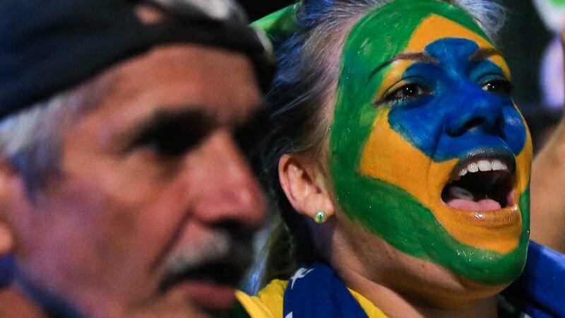 A woman protests against Brazil’s President Dilma Rousseff calling for her impeachment at Paulista avenue in Sao Paulo, Brazil, May 11, 2016. Photograph: Roosevelt Cassio/Reuters