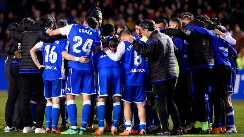 Deportivo players at the end of the game. Photo: Miguel Riopa/Getty Images