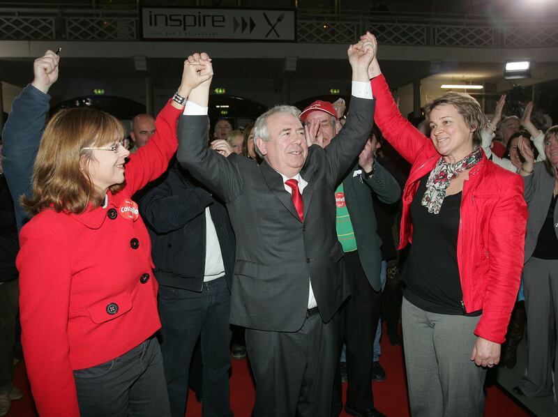 Joe Costello celebrates his election with wife Emer Costello (left) and fellow-party candidate Áine Clancy at the Dublin City Count Centre in the 2011 general election. File photograph: Alan Betson/The Irish Times

