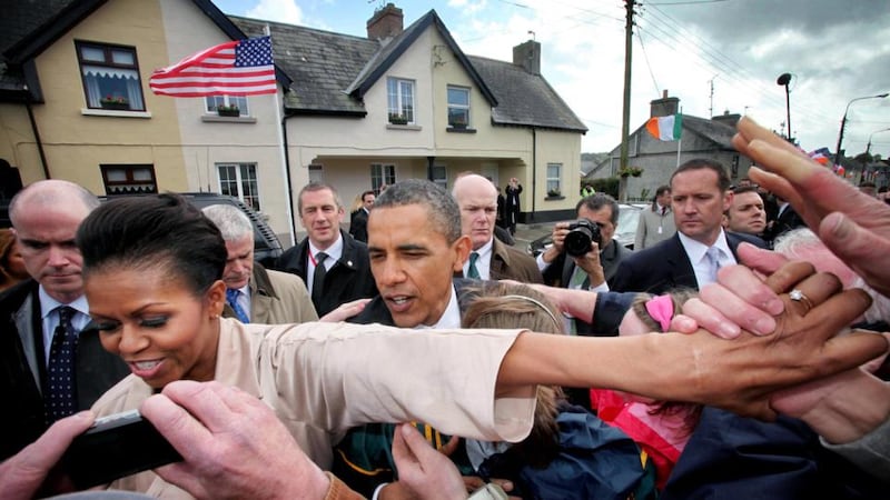 First lady Michelle Obama leads the way for her husband US president Barack Obama in Moneygall, Co Offaly, in May 2011. Photograph: Bryan O’Brien