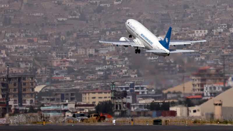 Aircraft takes off from Kabul: The man’s contacts in Ireland studied flight radar websites in an effort to move them towards the British or US military rather than troops from other countries.  Photograph: Karim Sahib/AFP